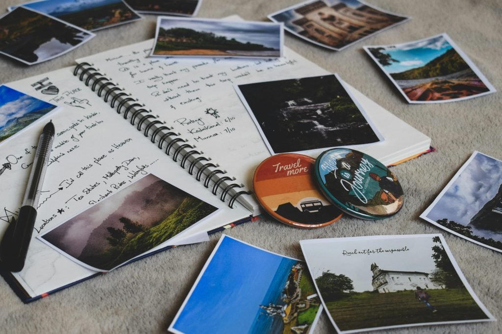 An open journal featuring images intended for a vision board