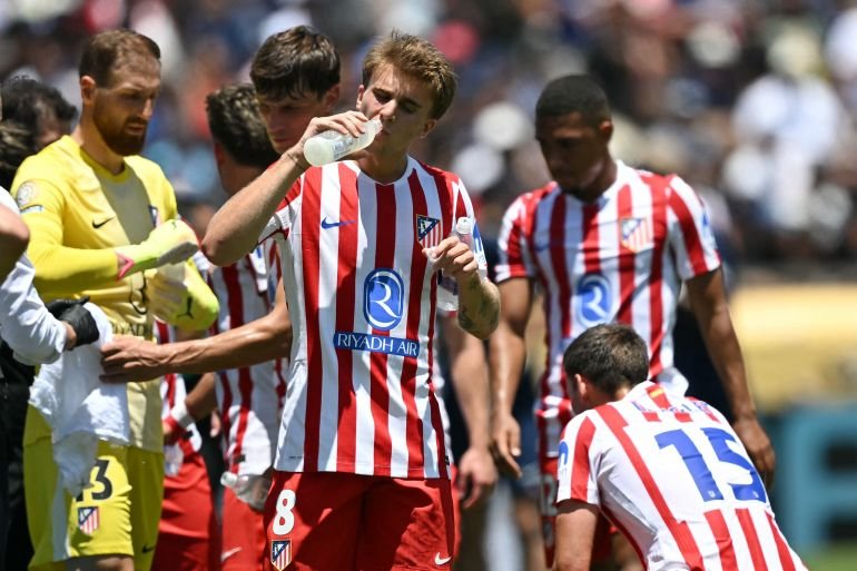 Atletico Madrid's Pablo Barrios takes a water break during the Club World Cup match against PSG on June 15, 2025, at the Rose Bowl in Los Angeles. (Photo by Yuri Cortez / AFP)