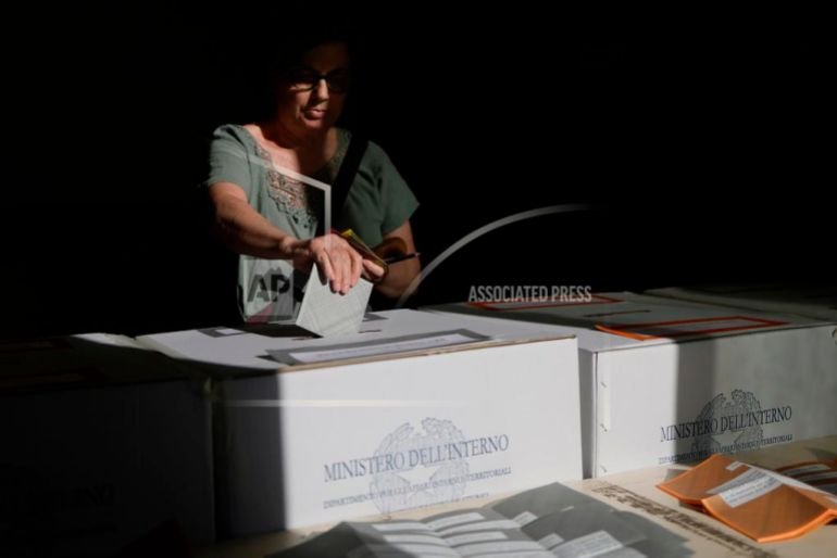 A woman votes during referendums on citizenship and job protections, at a polling station in Rome, June 8, 2025. [Cecilia Fabiano/LaPresse via AP]