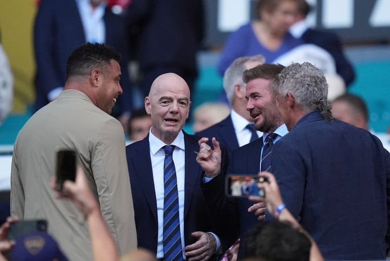 From left, former Brazilian footballer Ronaldo, FIFA President Gianni Infantino, and Inter Miami co-owner David Beckham conversing prior to the Group A match between Al Ahly and Inter Miami, June 14, 2025, in Miami. (AP Photo/Rebecca Blackwell)