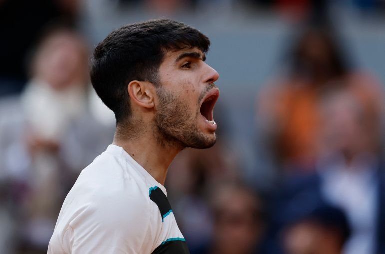 Alcaraz reacts during the French Open Final.