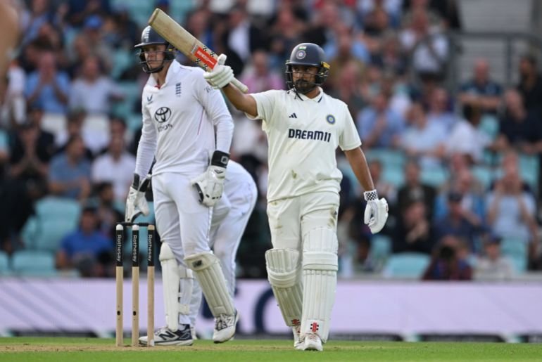 Karun Nair of India celebrates reaching his half century during Day One of the 5th Rothesay Test Match between England and India at The Kia Oval