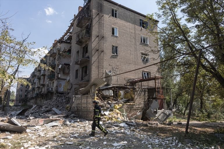 Emergency responders at a damaged site