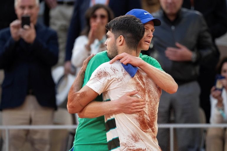 Carlos Alcaraz and Jannik Sinner after the men's singles final at the French Open.