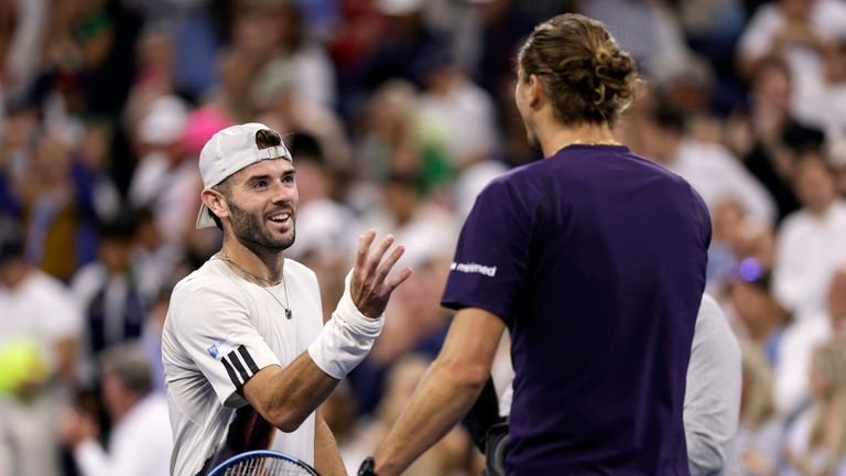 Jacob Fearnley and Alexander Zverev shake hands after their match at the US Open.